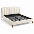Letto imbottito in tessuto crema con testiera e struttura in metallo e gambe in legno