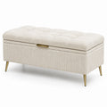 Cassapanca beige in tessuto bouclé con gambe in metallo dorato